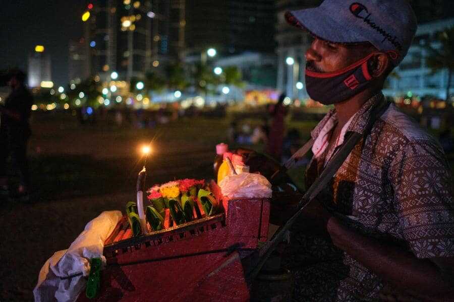 a seller at night in colombo sri lanka experiential journey