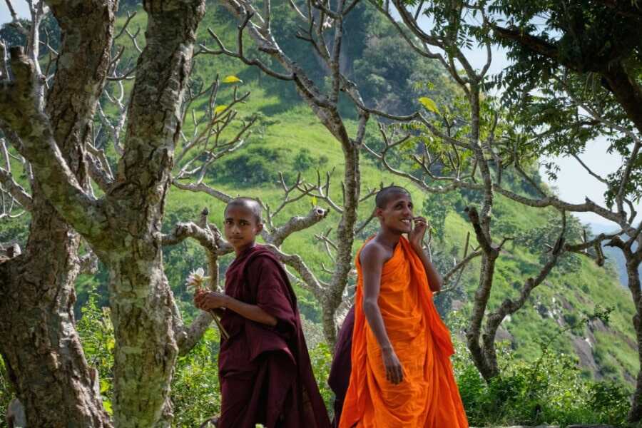 two buddhist monks at dambulla sri lanka experiential journey