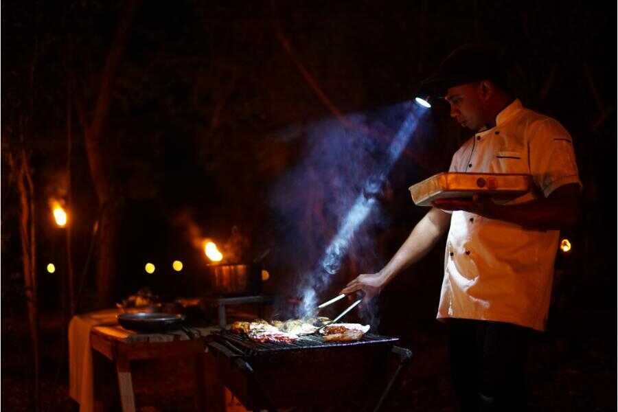 big game staff making dinner at udawalwe sri lanka experiential journey