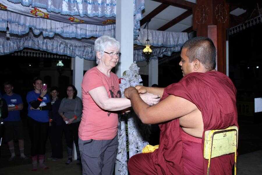 getting blessings from a buddhist monk adams peak sri lanka experiential journey