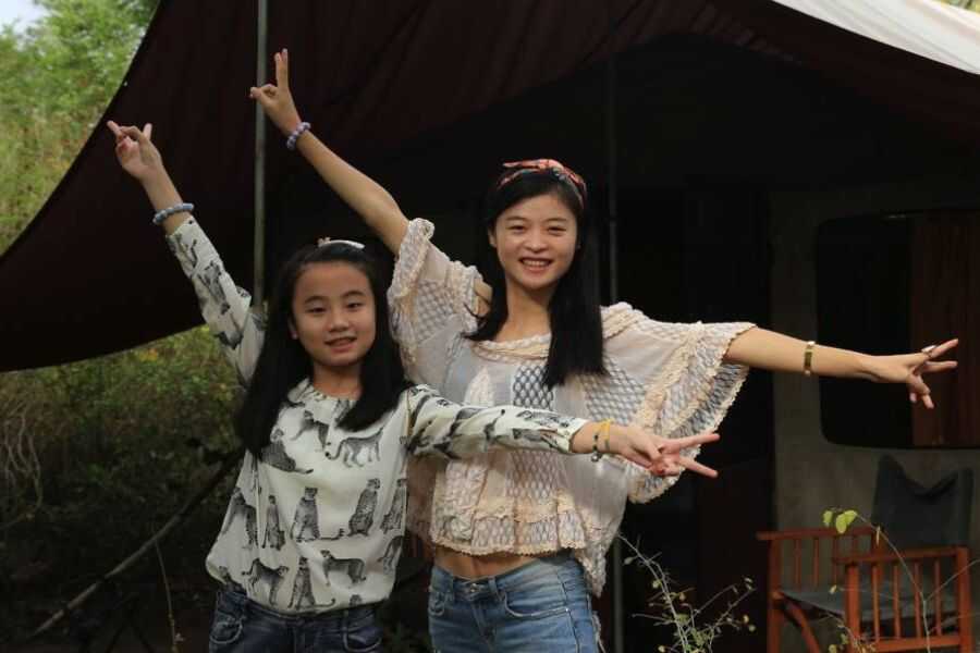two girls are relaxing at our campsites in sri lanka experiential journey