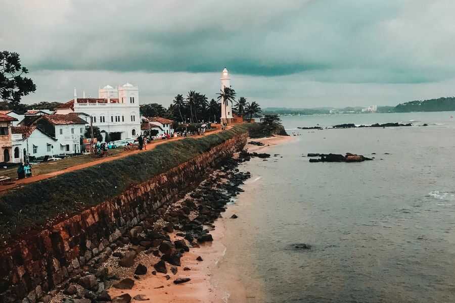 white painted lighthouse at galle in sri lanka experiential journey