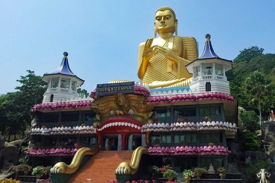 golden lord buddha staue at dambulla cave temple sri lanka experiential journey